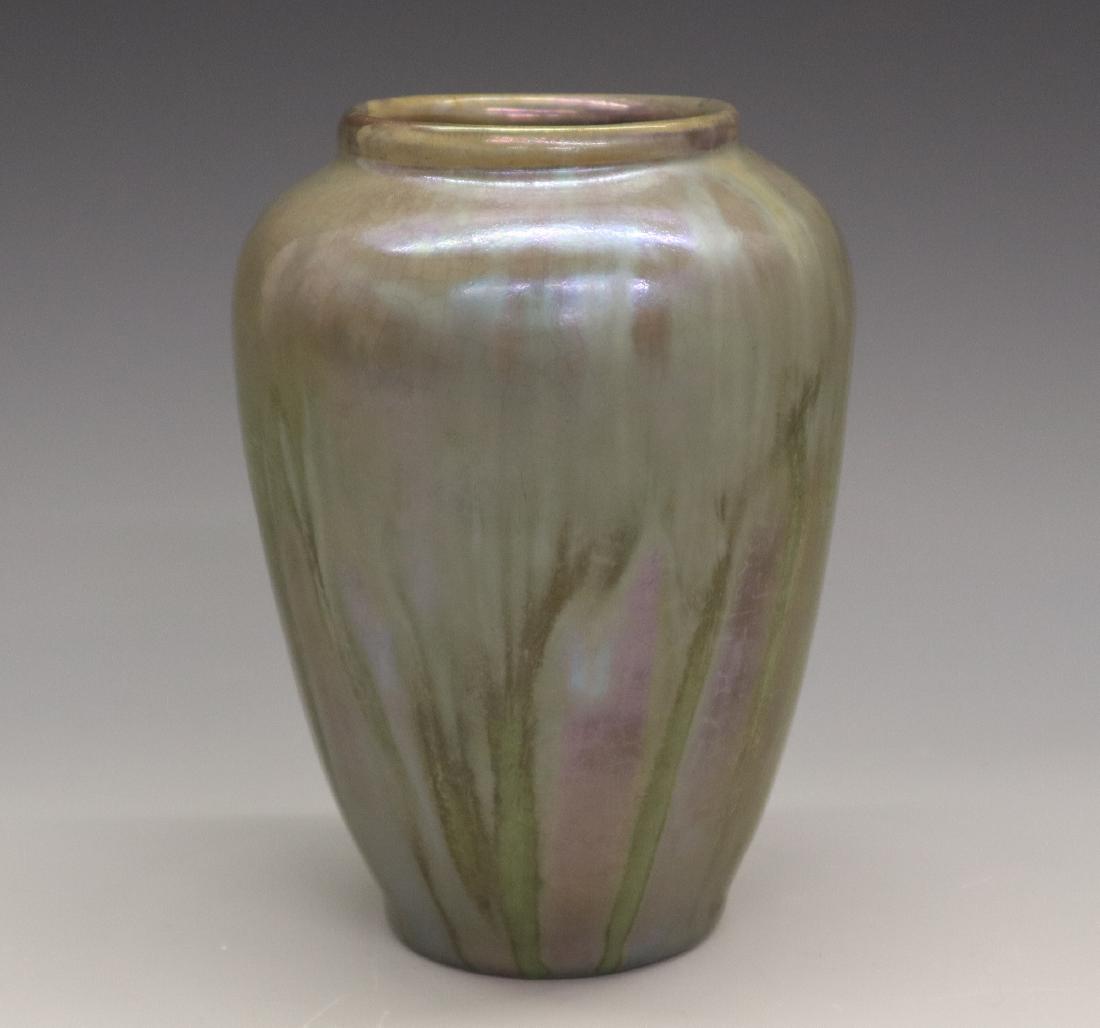 Pewabic Pottery Vase: A Pewabic Pottery Vase, c. 1920s. Having a straight lip and tapering form from the shoulder to the base, covered in a silver oxide reduction crackle glaze, in shades of mossy and earthy greens. Includ