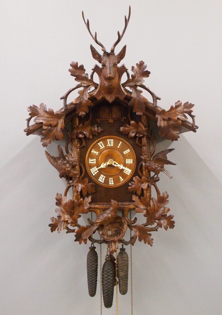 German Cuckoo Clock: An early 20th century German Cuckoo wall clock by GHS (Gordian Hellich & Sohne, Furtwangen, Germany). 30-hour Brass time & strike movement with Cuckoo and gong on the hour and Quail on the quarters. C