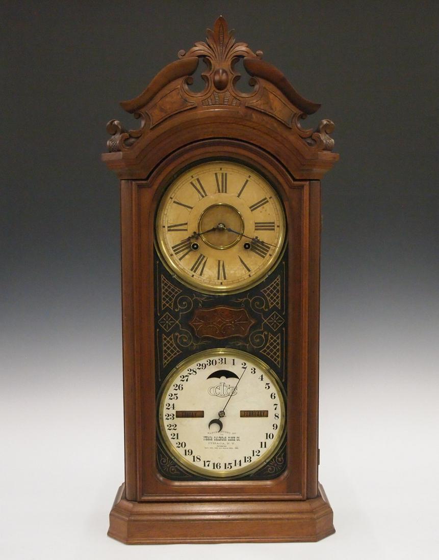 Ithaca Favorite No. 4 1/2 Calendar shelf clock: A late 19th century Ithaca "Favorite No. 4 1/2" model double dial calendar shelf clock. 8-day time & strike movement with lower calendar mechanism and papered metal dials. The upper movement is marked