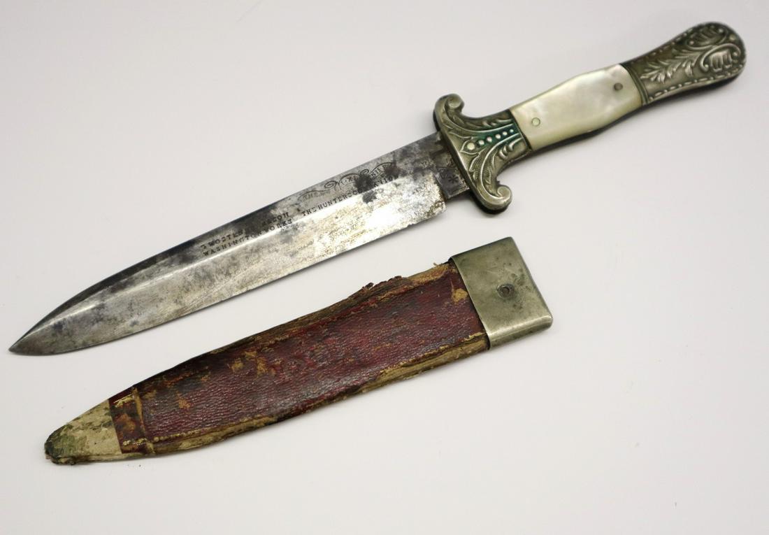 G. Wostenholm & Son Knife: A George Wostenholm & Son Washington Works "Hunters Companion". 5 1/2" long blade marked "G. Wostenholm & Son Washington Works Hunters Companion 'The Real I . XL Knife'" with "I.XL" on the ricasso, en