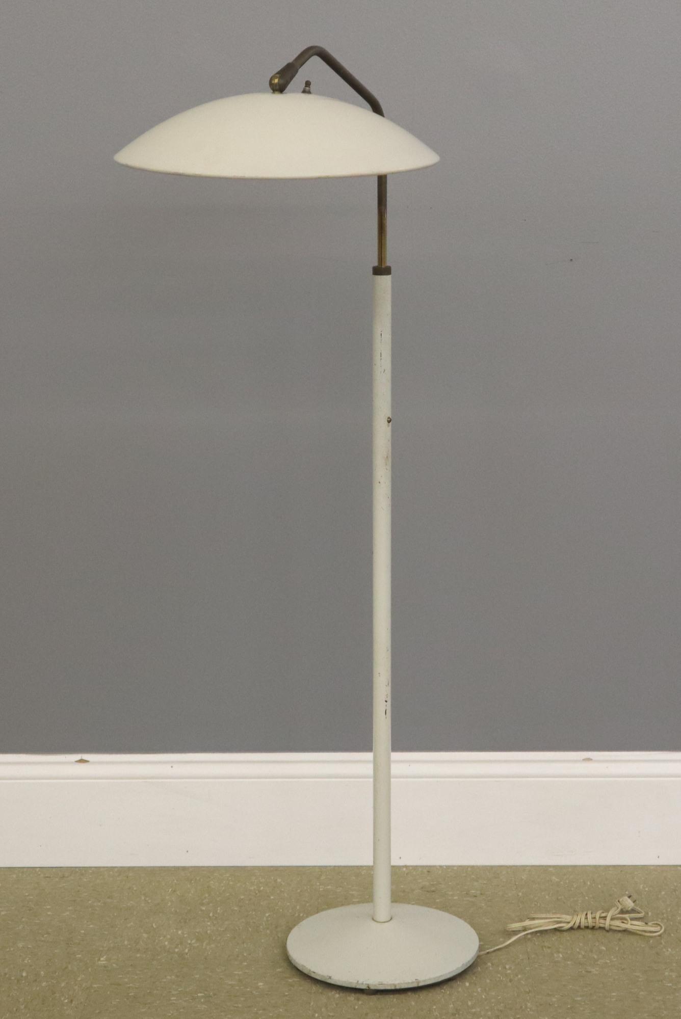 Gerald Thurston floor lamp: A Mid Mod floor lamp by Gerald Thurston for Lightolier. Painted metal shade and base. Some wear and minor damage. 47" high. ESTIMATE $100-150
