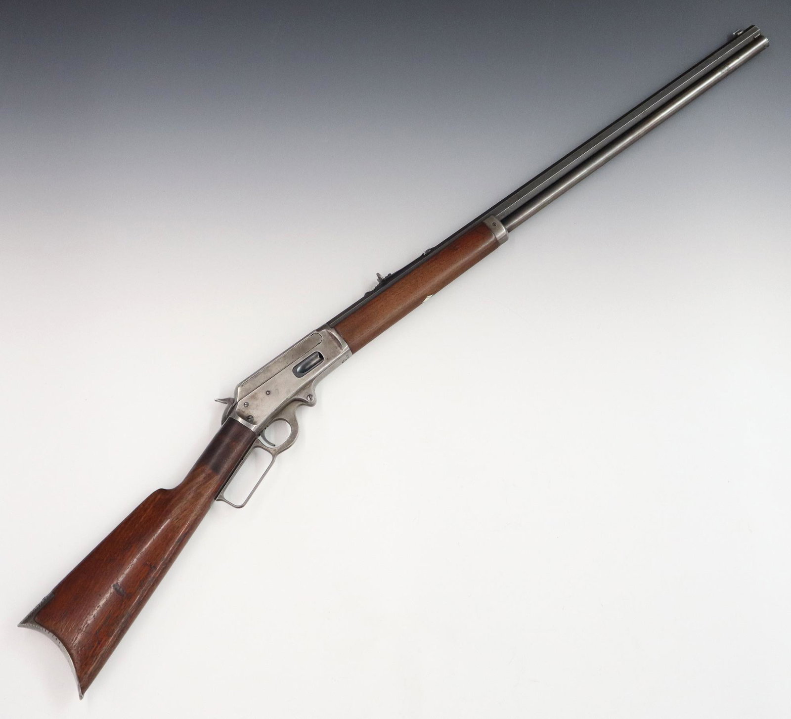 Marlin Model 1893 Rifle: A Marlin Model 1893 Lever Action 32-40 Caliber Rifle, c. 1904. Marked on top of the barrel "Marlin Fire-Arms Co. New-Haven, CT. U.S.A. Patented, Oct. 11, 1887. April 2, 1889. August 1. 1893" along wit