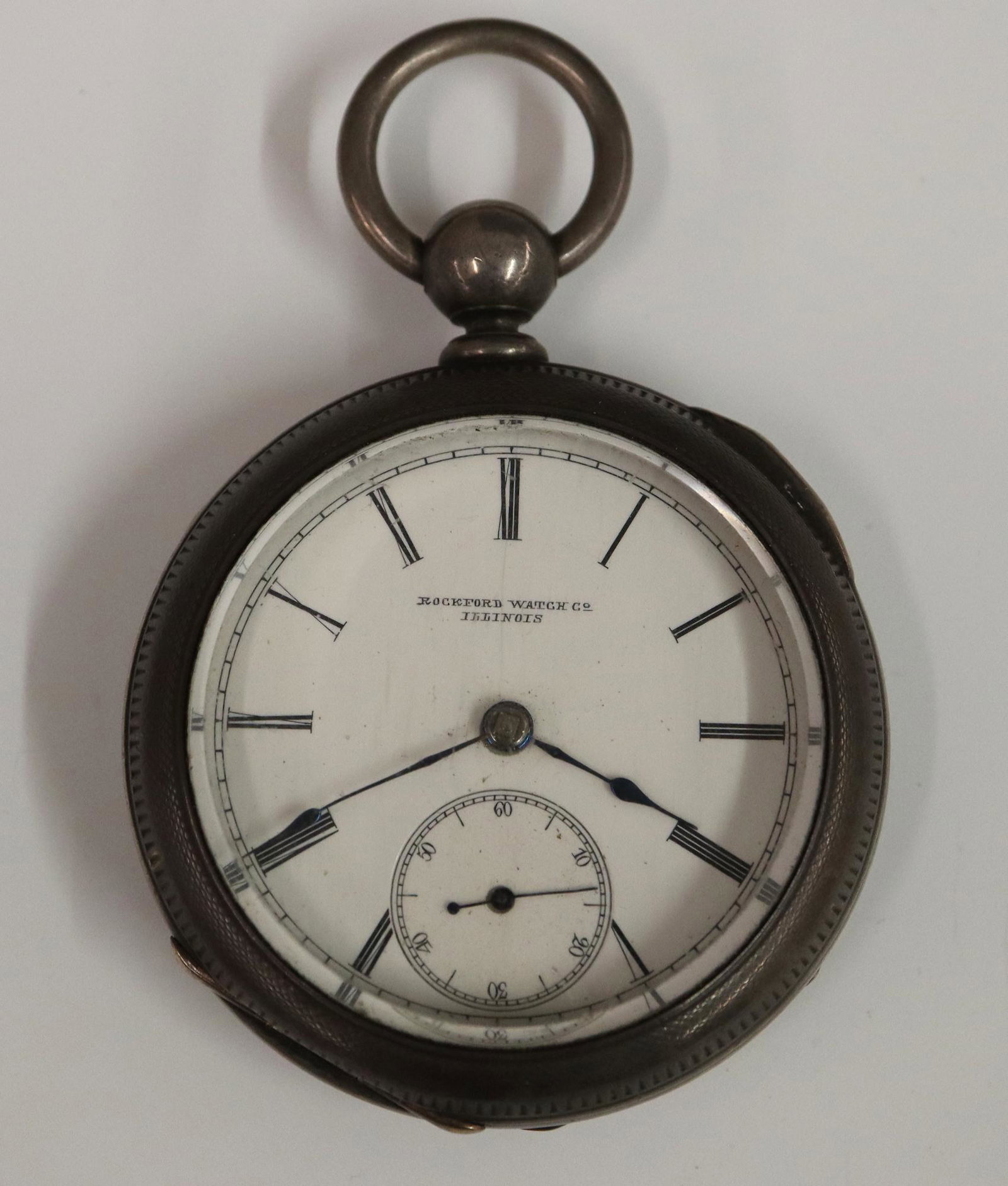 Rockford Pocket Watch: A Rockford Model 2 Coin Silver open face pocket watch ca. 1880. 18 size, 11 jewel, KW/KS jeweled movement with gilded plates, serial # 122132. Porcelain dial with Roman numerals. Some case wear, hairl