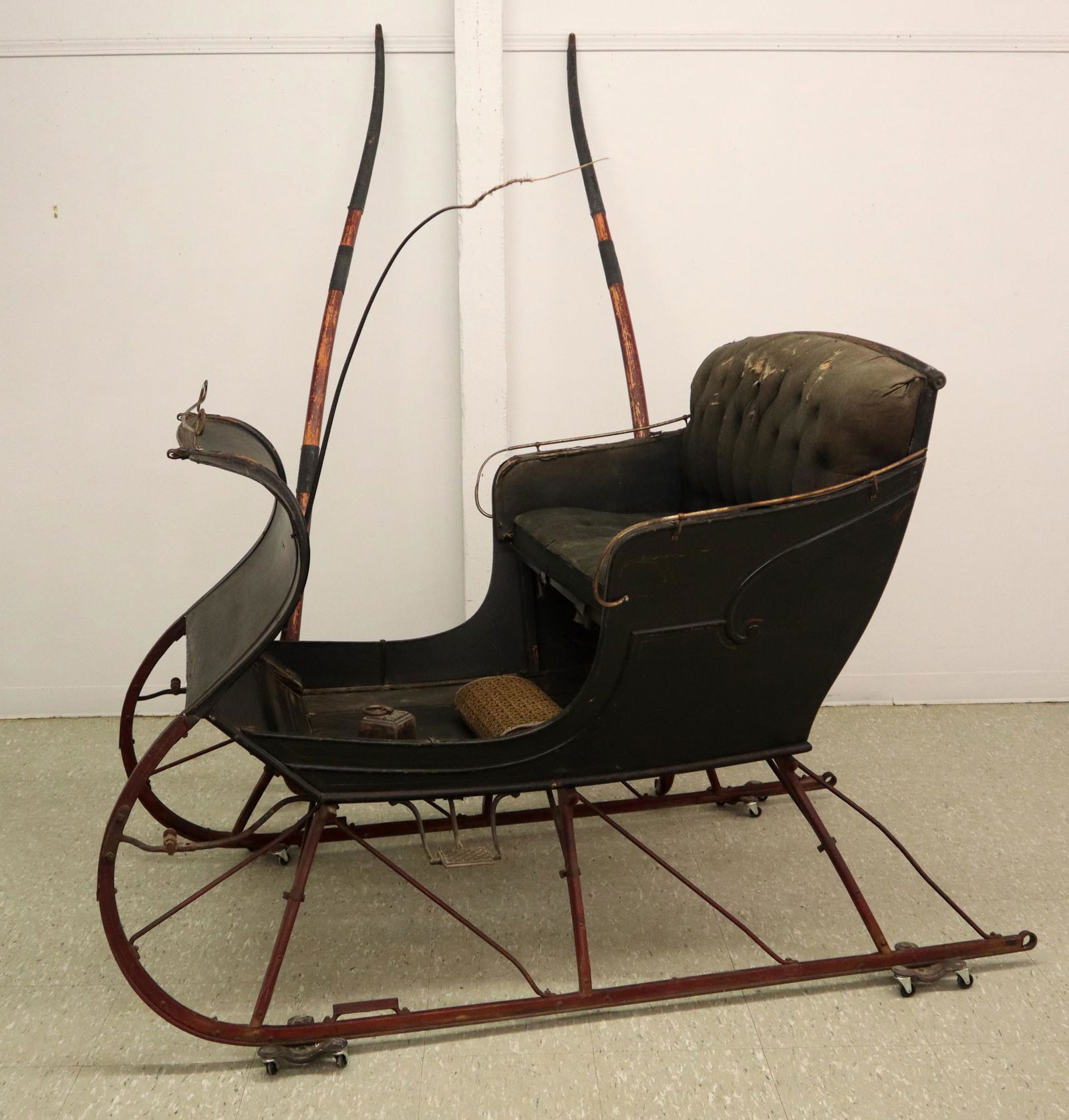 One Horse Cutter: A turn of the century horse drawn cutter by "The Collen & Becker Carriage Mfg. Co, Jackson, Mich". Single bench seat with Black painted body and original worn upholstery. Original paint with some wear