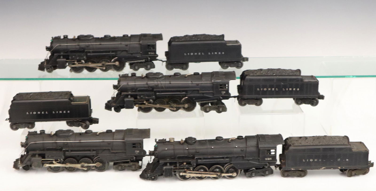 4 Lionel Locomotives w/Tenders: Four Post-War Lionel O Gauge Locomotives with Tenders. Including locomotive #736 and tender #2466W, locomotive #726 with tender #2466WX, locomotive #726RR and tender #6466WX, and locomotive #726RR and