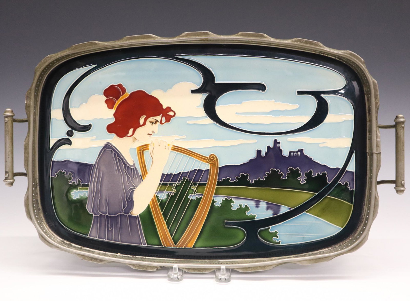 Johan Von Schwarz/C. Luber Art Nouveau Tray: An Art Nouveau Johan Von Schwarz Enameled Ceramic Tray, Designed by Carl Sigmund Luber. Rounded rectangular tray set with enameled ceramic plaque that is decorated with the image of a Classical style 