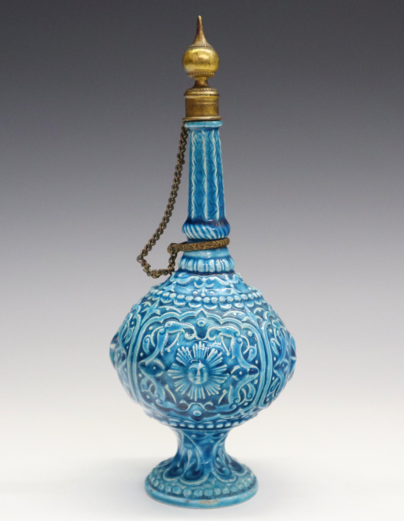 Th. Deck Rosewater Sprinkler: A Late 19th Century Theodore Deck Glazed Earthenware Rosewater Sprinkler. Turkish inspired bottle form vessel with "Bleu de Deck" glaze overall is fitted with brass ring and cap, and is decorated with