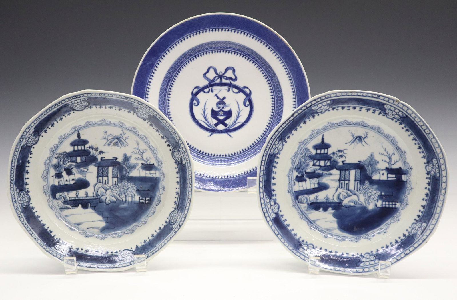 3 Chinese Export Plates: Three Late 18th/Early 19th Century Chinese Export Porcelain Plates. Including 2 "Nanking" pattern plates and 1 Armorial plate features "Arms of Bruce" at the center of the well and remnants of gilt ac