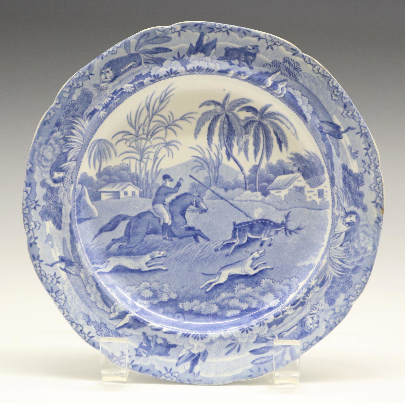 Spode Indian Sporting Series Plate: A 19th Century Spode "Indian Sporting Series" Plate. Round blue and white transferware plate with scene entitled "Hog Deer at Bay" and is contained within a border with a motif consisting of various e