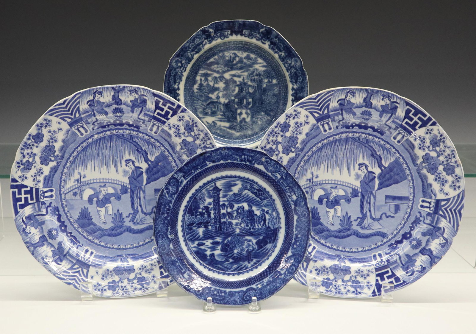 4 English Blue & White Transferware Plates: Four Late 18th to Early 19th Century English Blue and White Transferware Plates. Including 2 small Chinoiserie plates by Joshua Heath and 2 Spode "Lange Lijsen (also known as Long Eliza or Jumping Boy