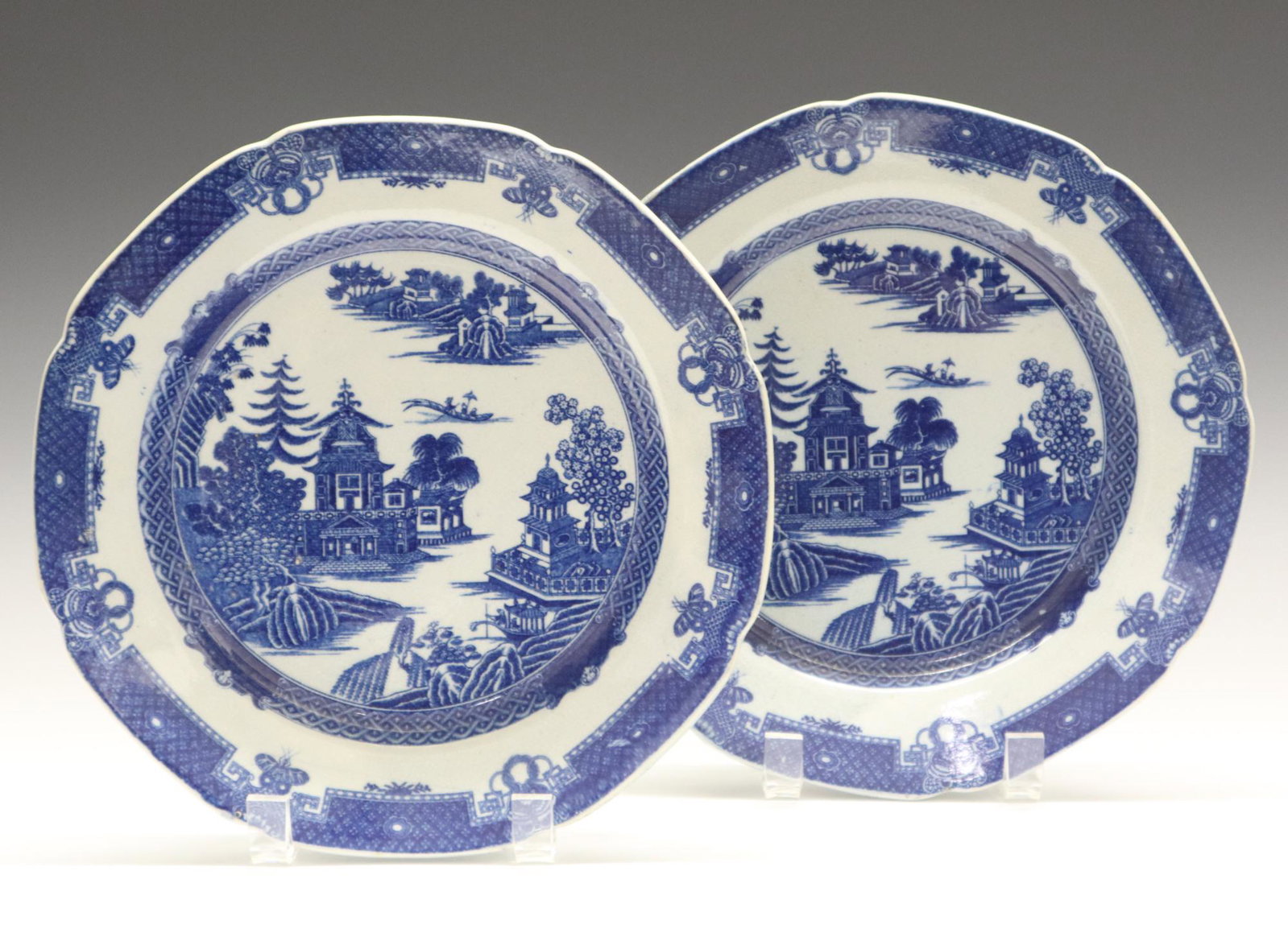 2 J. Heath Blue & White Plates: Two Late 18th Century Joshua Heath Plates. Blue and white transferware plates in the "Palladian Pagoda" pattern. Both with impressed maker's mark "IH" and "Patricia Davies Collection Sworders" labels 