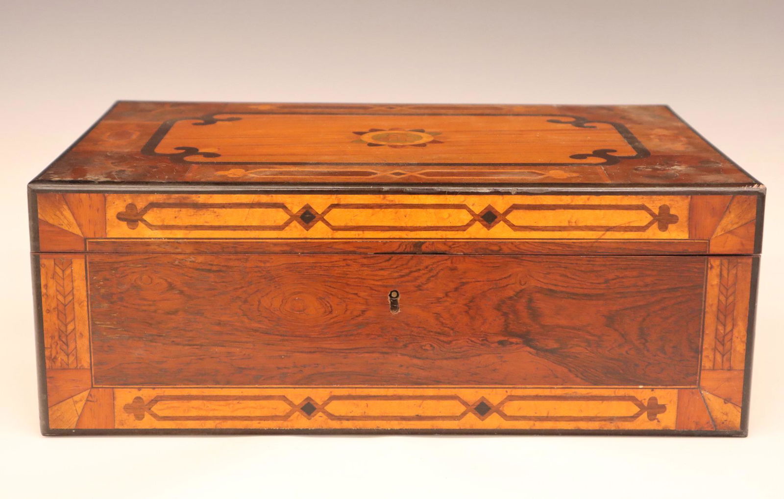 English Inlaid Lap Desk: A Good 19th century English Mahogany Inlaid Lap Desk. Top folds open to a writing slope with hinged stationary storage, fitted interior with a spring loaded secret panel hides two small drawers. Old F