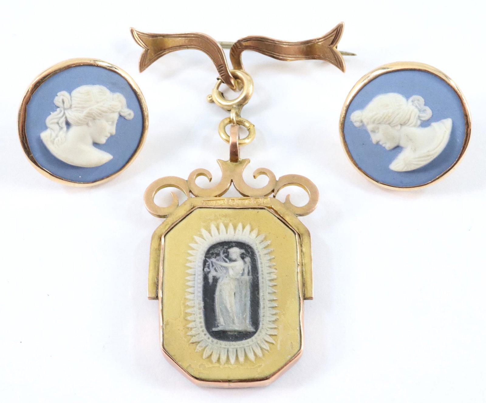 Jasperware Pendant & Earrings: Turn of the century 9k Gold Jasperware Pendant and Earrings. Each with applied classical figures in White, the pendant with varying colors on each side. Minor wear. Up to 1 7/8" high. ESTIMATE $100-20