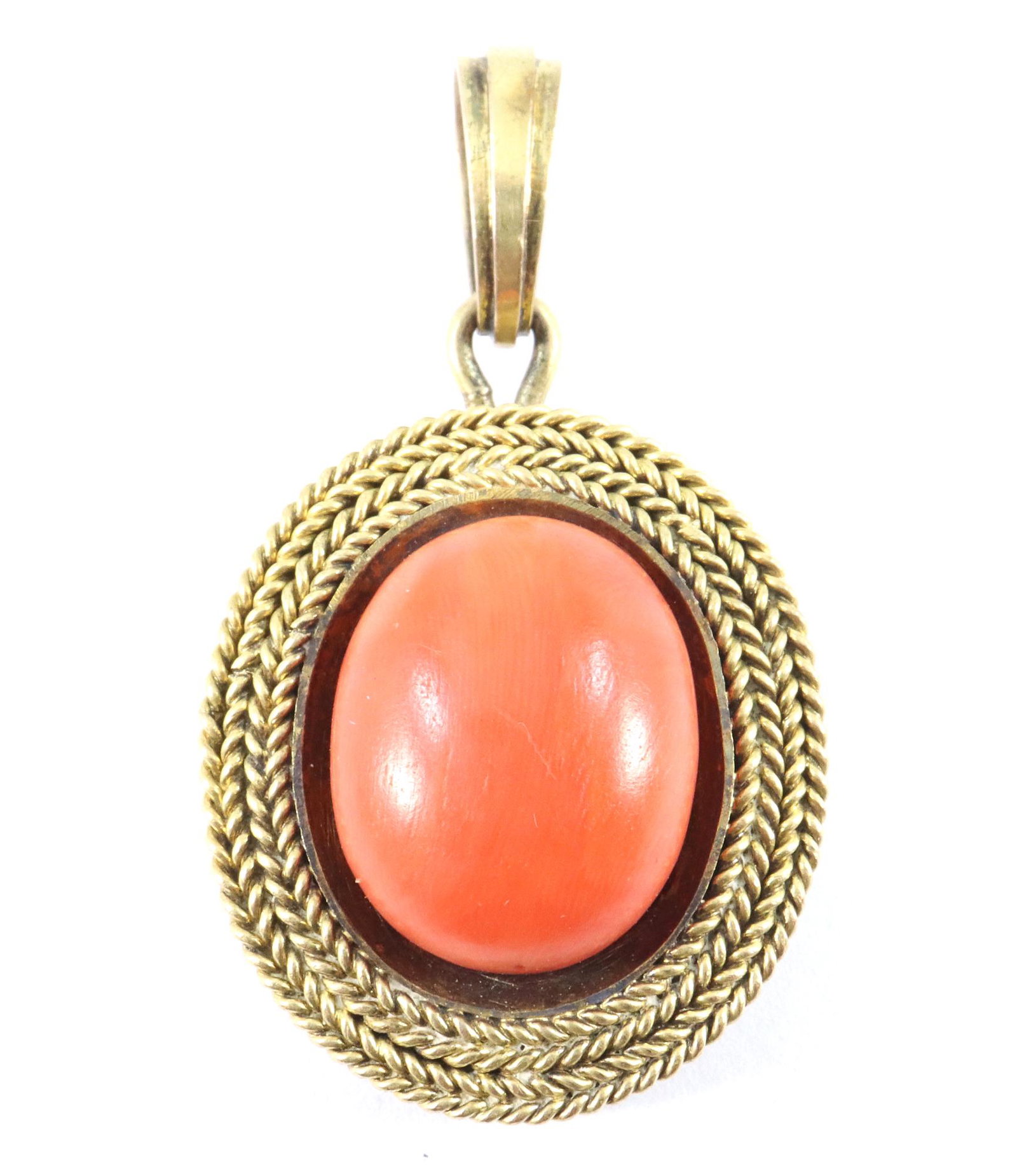 GF Locket with Coral: A vintage Gold filled locket with cabochon Coral and rope edge detail. Some wear. 1 1/8" high. ESTIMATE $60-80