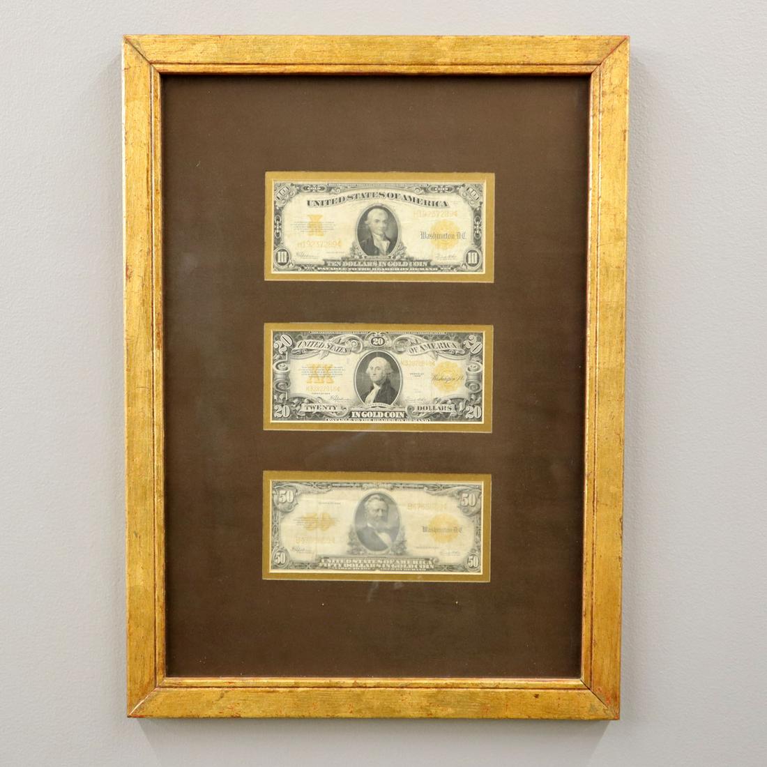 3 1922 Gold Certificates: Three 1922 Gold Certificates in denominations of Ten, Twenty, and Fifty dollars. Framed with both front and back visible. All bills have been used, folded, and have creases. Frame is 16 1/2 x 22" high
