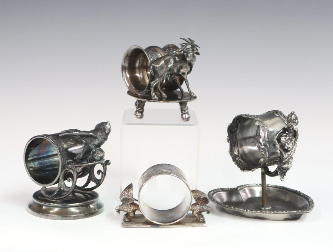 4 Figural Napkin Rings: Four turn of the century silver plated figural napkin rings, three are decorated with animals figures and one with a putti figure. All with minor wear and some with minor loss to the silver plate. Up