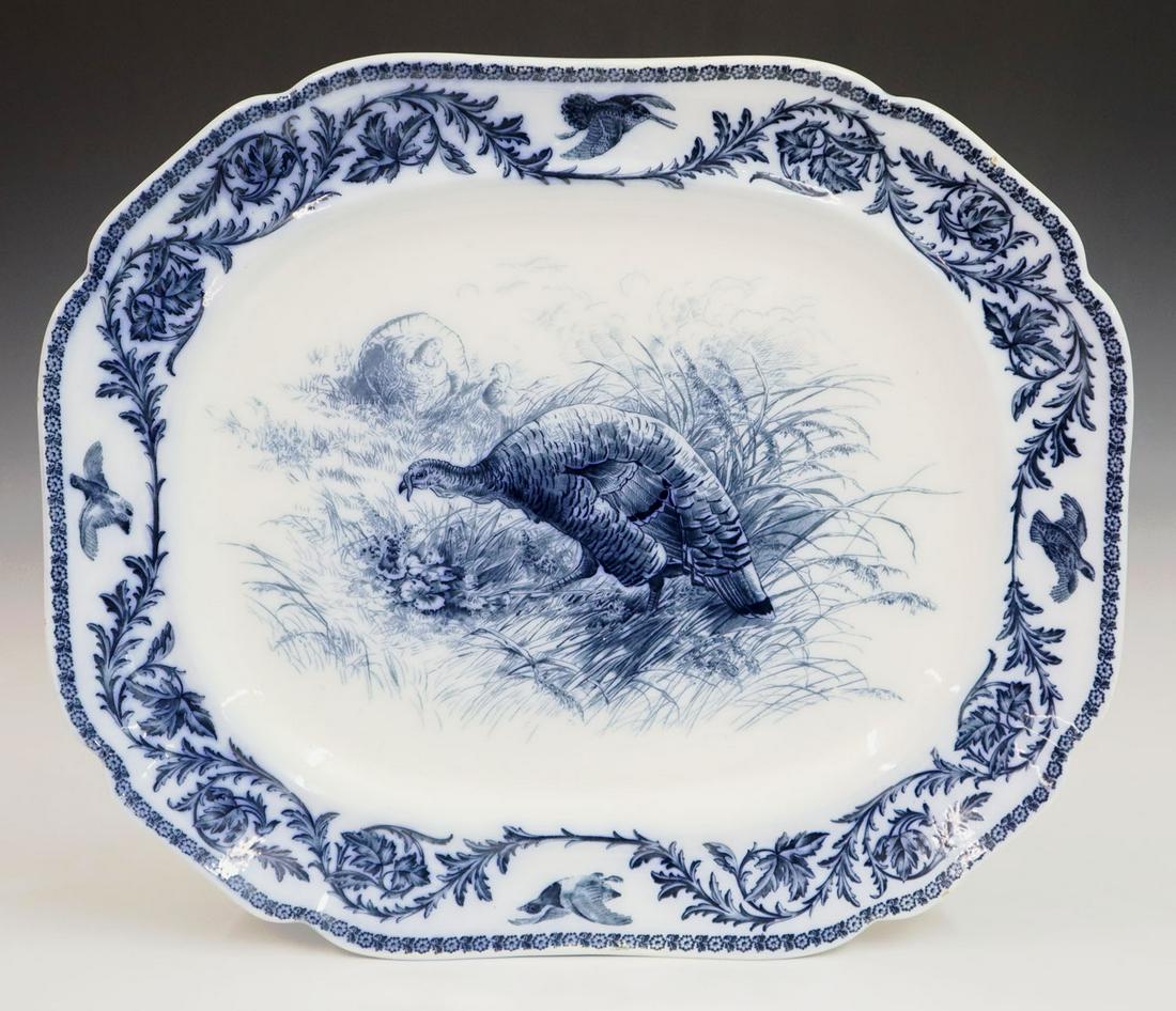 Cauldon Turkey Platter: Turn of the century Cauldon blue and white transfer turkey platter. Decorated with quail and partridge border, marked Cauldon, England. 16 x 19" wide. ESTIMATE $100-200