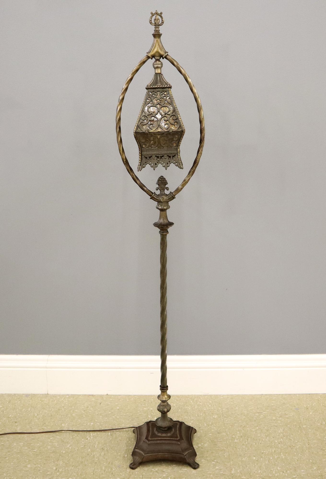 Brady Patented Reading Lamp: A 1920's Gothic Revival Magnifying floor lamp by the Brady Lite Co. Detroit. Patinated iron lamp with a magnifying reading light under an adjustable hinged cover with "Mica" glass panels. Old patina w