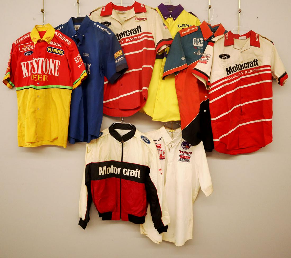 8 Race Crew Shirts: Eight 1980s-90s race crew shirts. Short sleeves with various sponsor logos. Some wear. Size Medium and Large. ESTIMATE $100-200