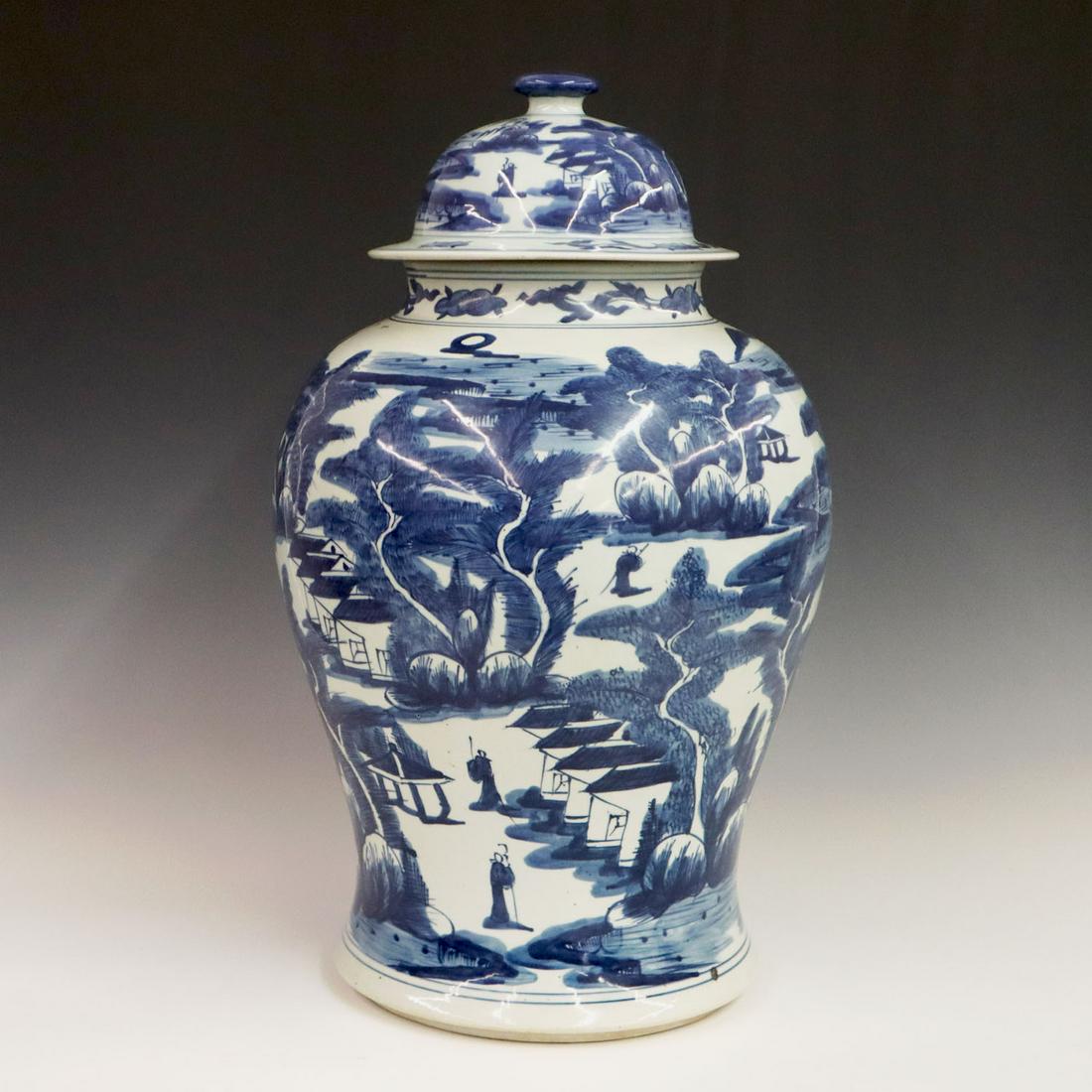 Large Chinese Covered Ginger Jar: A large Chinese Blue & White covered ginger jar. Marked on the bottom with Kangxi characters. Minor surface wear, chip in cover. 21" high. ESTIMATE $400-600