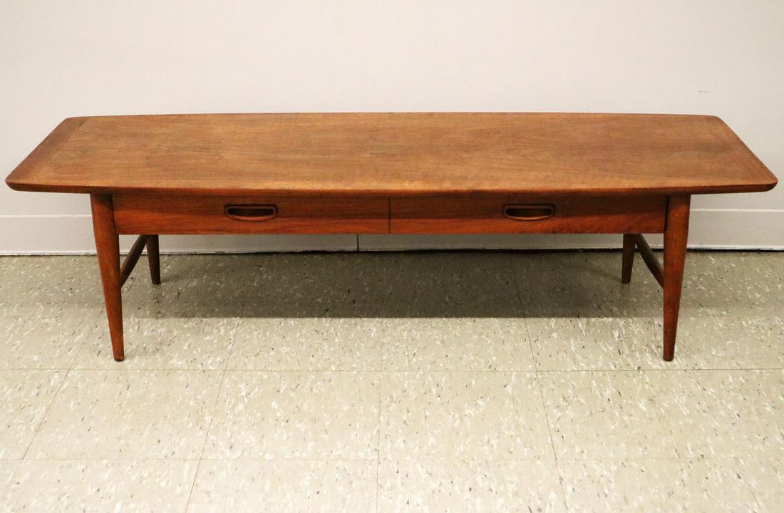 Lane Altavista Coffee Table: A mid-20th century Lane "Altavista" Walnut coffee table. Single drawer with turned legs and stretchers. Stamped "Lane Altavista, Virginia" inside drawer. Original finish with several faint water marks