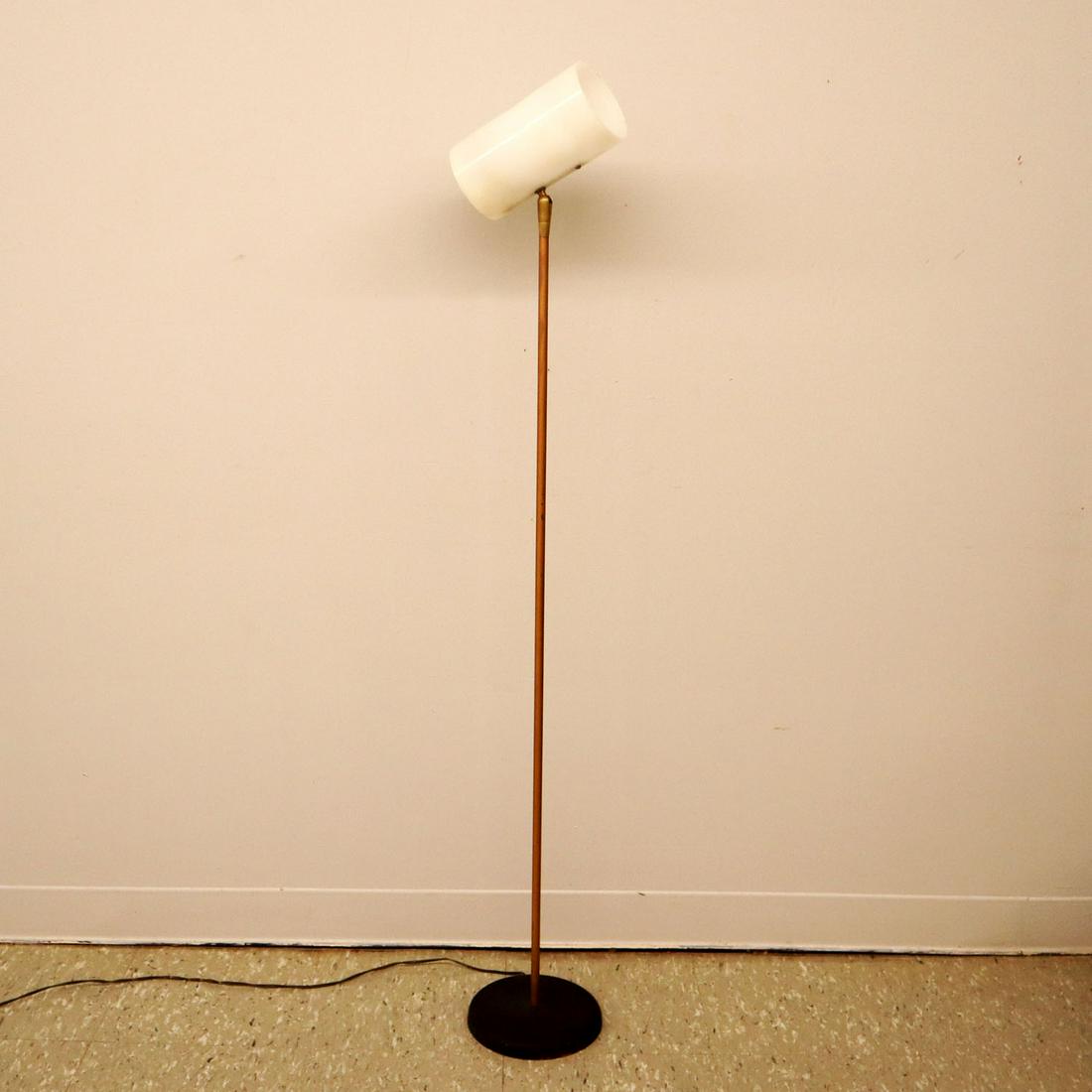 Brass & Enamel Floor Lamp: A mid-20th century brass & enamel floor lamp. With an adjustable acrylic "bullet" shade. Wear to brass and original wiring. 54" high. ESTIMATE $100-200