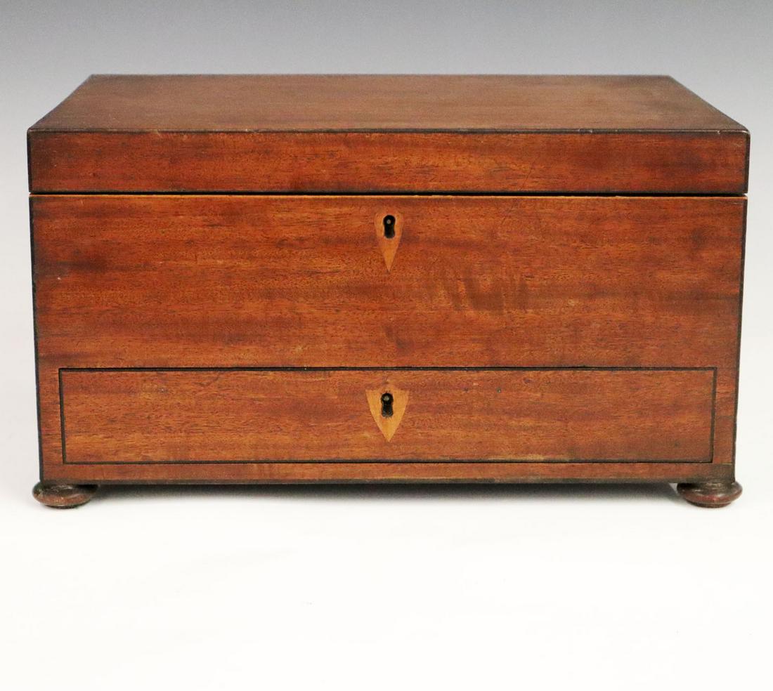 Regency Jewlery Box: An early 19th century English Regency mahogany jewelry box. With brass handles, one exterior drawer and one divided lift-out tray. Minor wear to old finish and wear to paper interior. 14 x 9 1/2 x 7 3