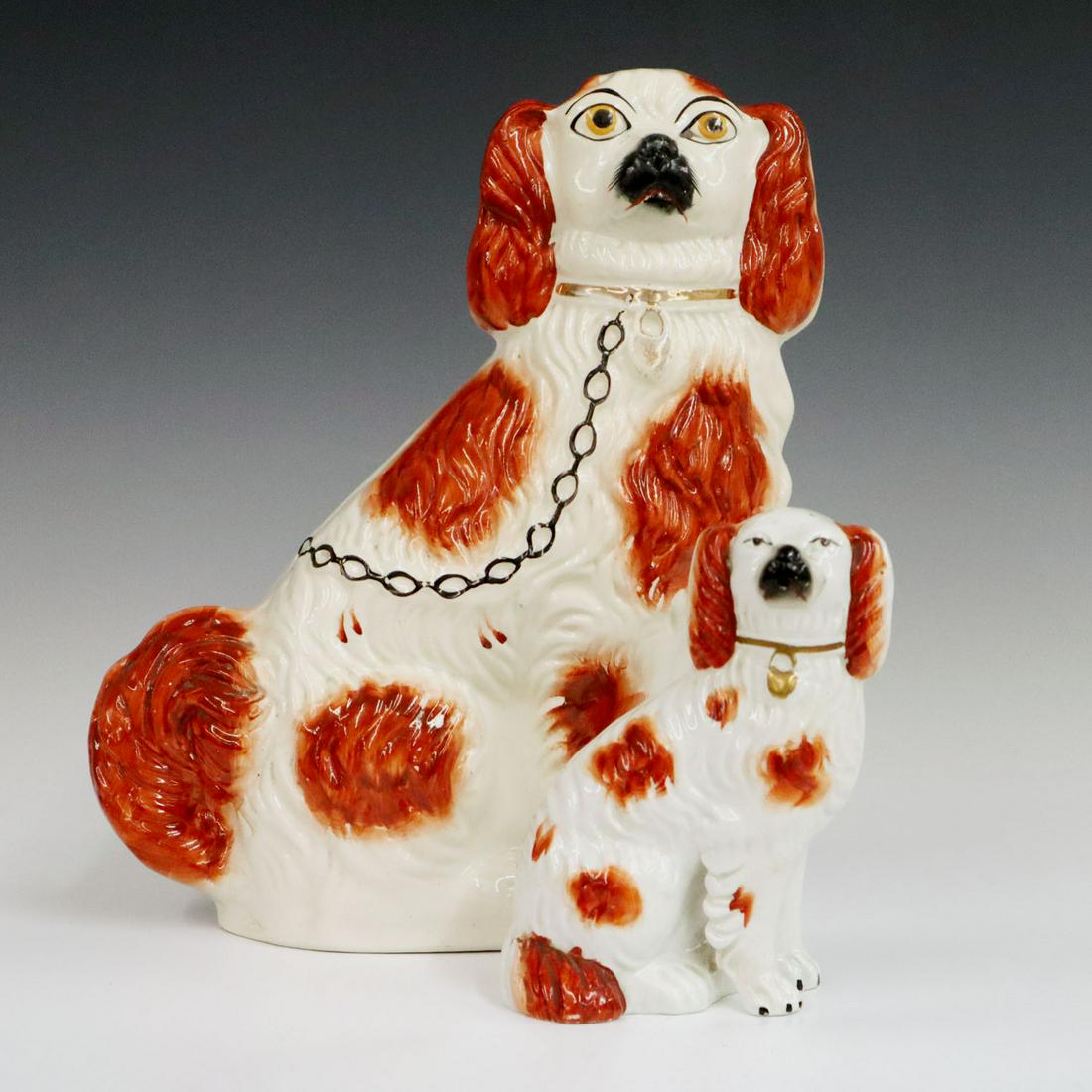 2 Staffordshire Dogs: Two late 19th century red & white Staffordshire dogs. Wear to collars and some minor color loss to larger. Some crazing to glaze. Up to 12" high. ESTIMATE $50-100
