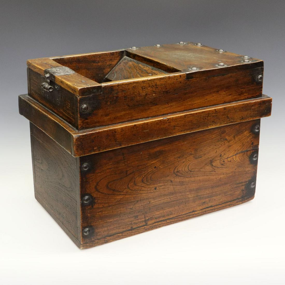 Japanese Money Box: A 19th Century Meiji Period Japanese Zenibako. Money box is of wood construction with forged iron hardware. Top slot portion is removable. Probably missing a cover, lacking a latch and lock; wear and 