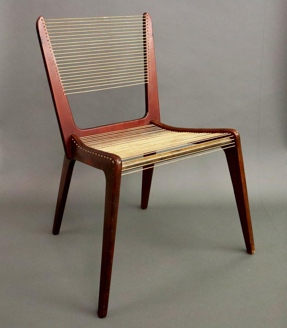 Jacques Guillon Cord Chair: A Mid 20th Century "Cord" Chair Designed by Jacques Guillon for Modernart, Canada. Consisting of a teak frame, with original dark finish, and cord back and seat. Old tight crack at the top of one leg,