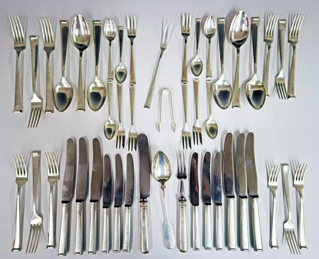 49 pcs of German .800 Silver Flatware: Forty-Nine Pieces of German .800 Silver Flatware. Seven piece setting for six, consisting of dinner knives, dessert knives, tea spoons, tablespoons, dinner forks, dessert forks, and fish forks along w