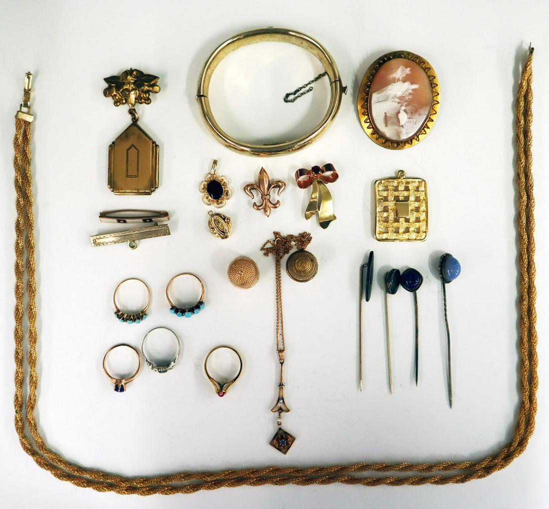 Collection of Gold Filled Jewelry: A Collection of Twenty-Two Pieces of Gold Filled Jewelry. Including a carved cameo brooch, 5 rings with various stones, 4 brooches, 2 thimbles, 3 stickpins, 3 pendants (including one with a chain), 2 
