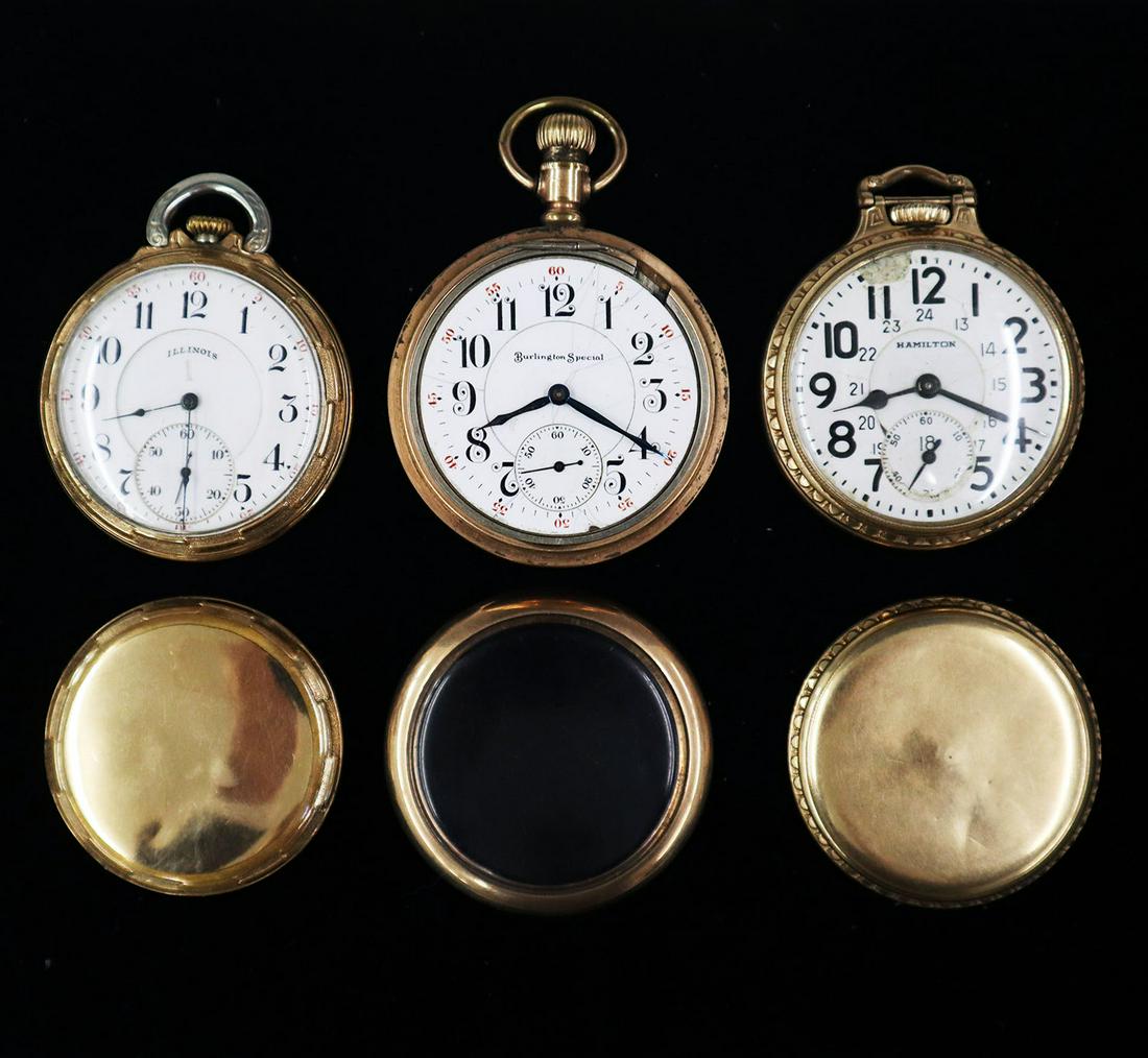 3 Railroad Type Watches: Three Gold Filled Railroad Type Watches. Including an Illinois 15 jewel stem set in an Illinois screw back case, a Burlington Special 19 jewel lever set in a B & B Royal flip out case, and a Hamilton 