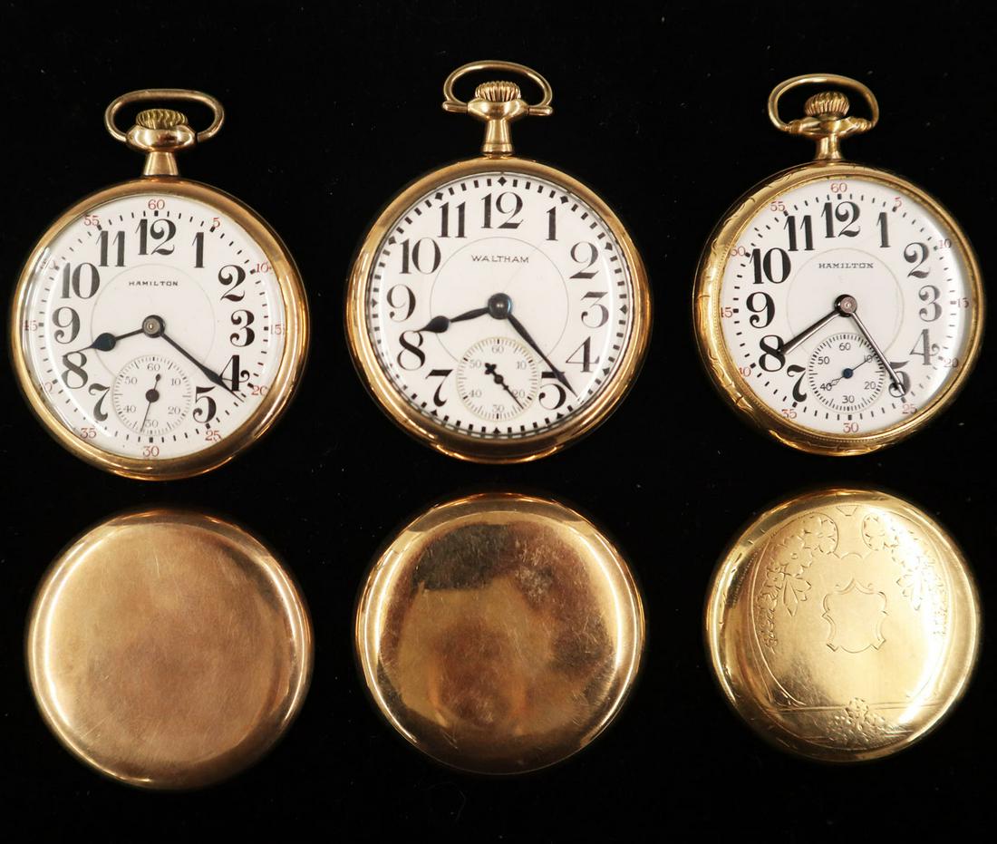 3 Railroad Type Watches: Three Gold Filled Railroad Type Watches. Including a Hamilton 21 jewel lever set in a Wadsworth screw back case, a Waltham 21 jewel lever set in a Philadelphia screw back case, and a Hamilton 21 jewel