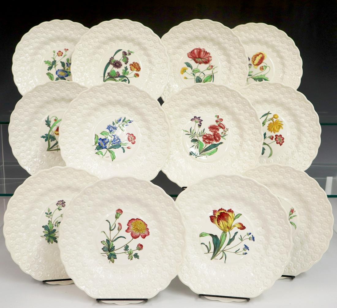 12 Spode Botanical Plates: A Set of Twelve Spode Botanical Plates. Each is transfer decorated with hand coloration at the well with molded daisy patterned borders. All are artist signed, "H. Bull"; numbered, "Copeland Spode Eng