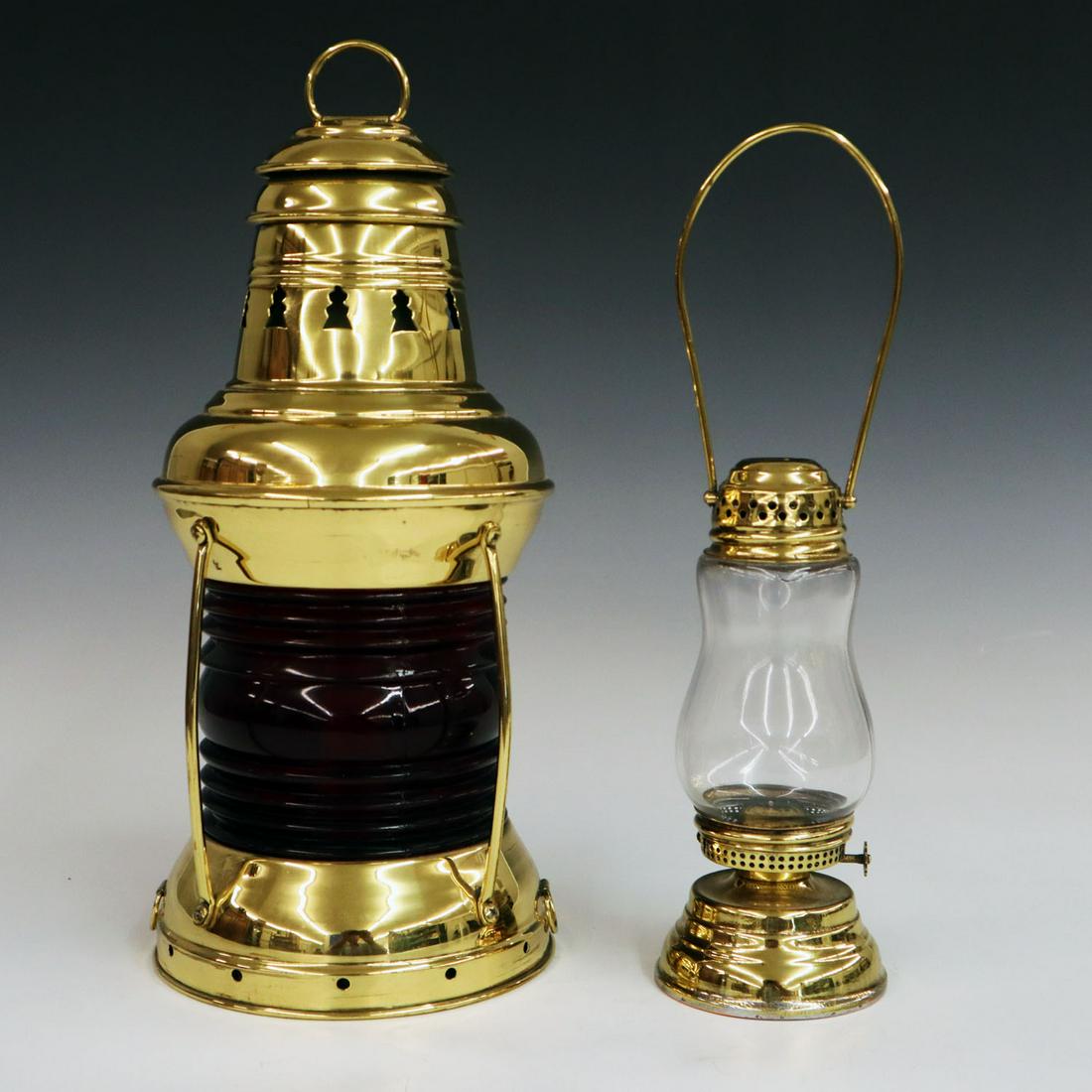 2 Brass Lamps: Two Early 20th Century Brass Lamps. Including 1 small ship's lamp with a red (starboard) lens together with 1 skater's lamp, polished, with swing handle. Old solder marks on bottom interior of ship's 