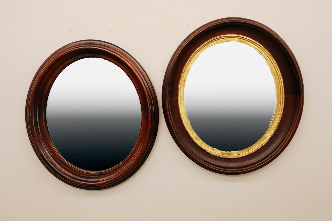2 Walnut Picture Frames: Two Late 19th Century Walnut Picture Frames. Each is of oval form with molded edges; one with a gilt liner and an older finish. Mirrors are replacements. Minor wear to gilt liner and finish of each. 1