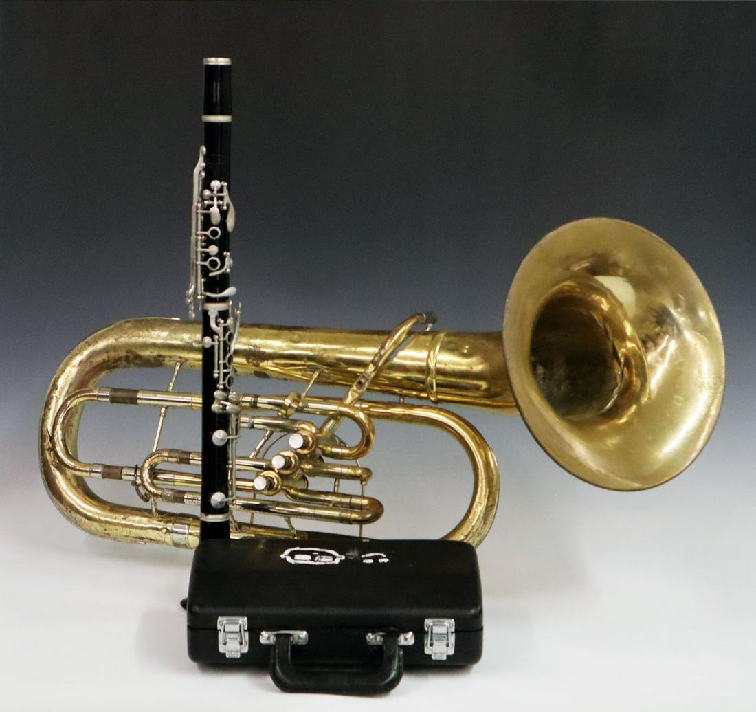 2 Musical Instruments: Two Mid-20th Century Musical Instruments. Including 1 F.E. Olde & Sons (Fullerton, California) "Studio Model" tuba horn, serial #668725, and 1 reso-tone #3 Clarinet in case. Tuba horn has scratches, d