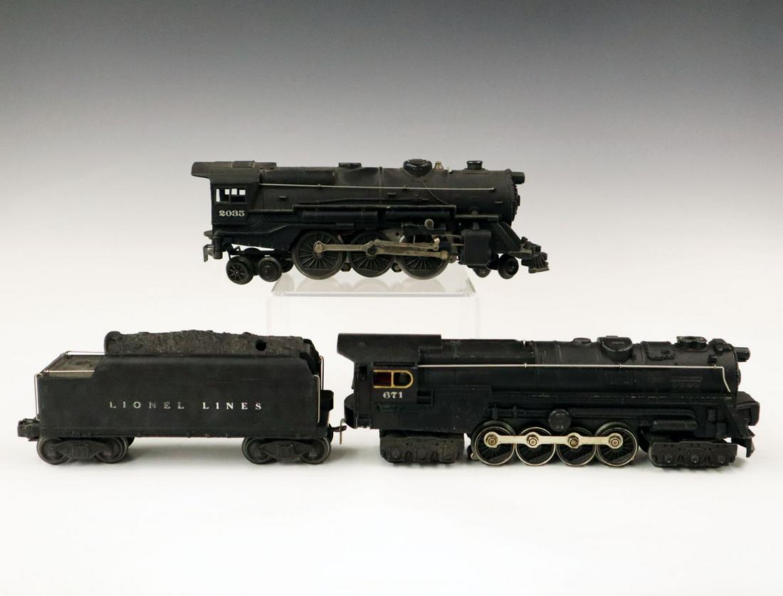 Lionel Group: A Post-War Lionel Group. Includes 671 O-Gauge Locomotive with 671 tender and a single 2035 locomotive in original paint. Minor wear and losses to paint, up 18" long. ESTIMATE $100-200