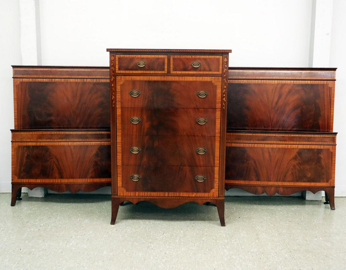 8 pc Johnson Furniture Co. Bedroom Set: A 1920's Eight Piece Johnson Furniture Co. Hepplewhite style Bedroom Set. Mahogany with satinwood drawer banding and vine inlay includes a tall chest, a low chest, a vanity, a pair of twin beds, a nig