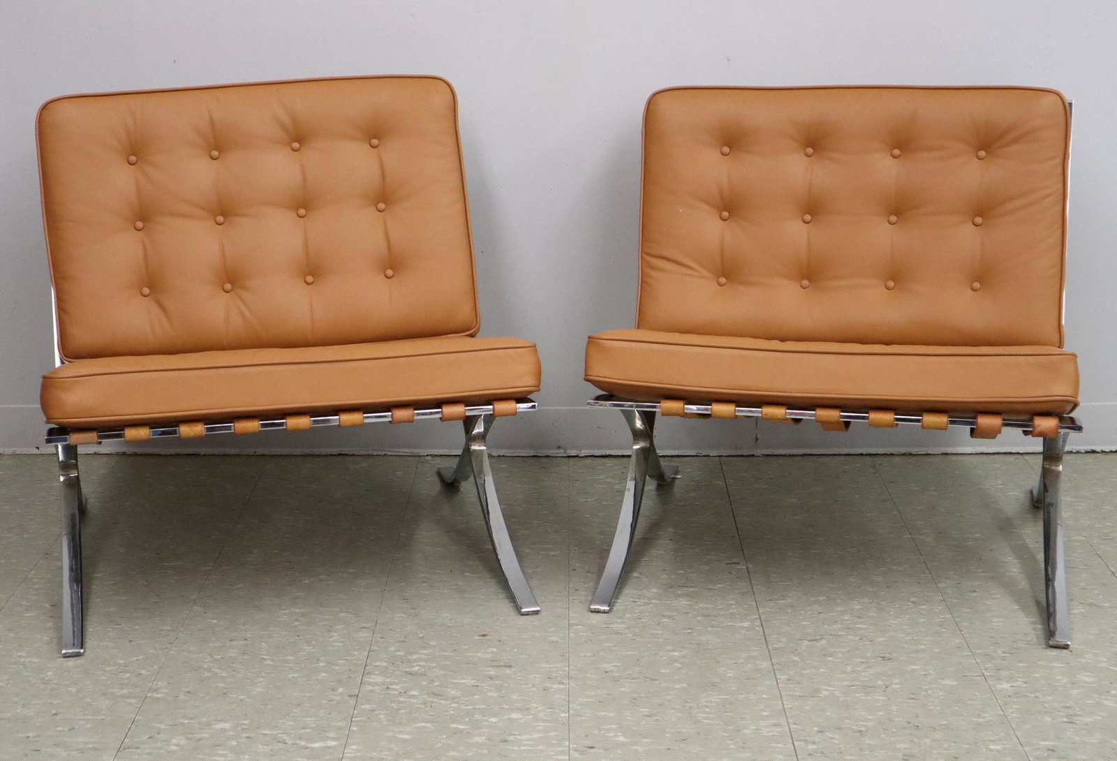 Pr. Mies Van der Rohe Barcelona Chairs: A Pair of 1960's Mies Van der Rohe for Knoll "Barcelona" Chairs. Chrome plated steel frames and leather cushions (two of which are original). Unmarked. Some losses to plate at seat to back joint and o