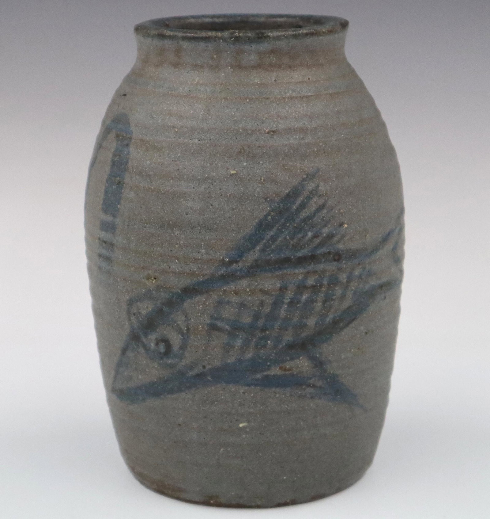 Harvey K. Littleton Stoneware Vase: Harvey K. Littleton, American, 1922-2013. Mid 20th century Blue stoneware vase with fish motif. Incised mark "HL 50" on foot rim. Good condition. 4 3/4 x 7 1/2" high. ESTIMATE $400-600 Ex Collection: