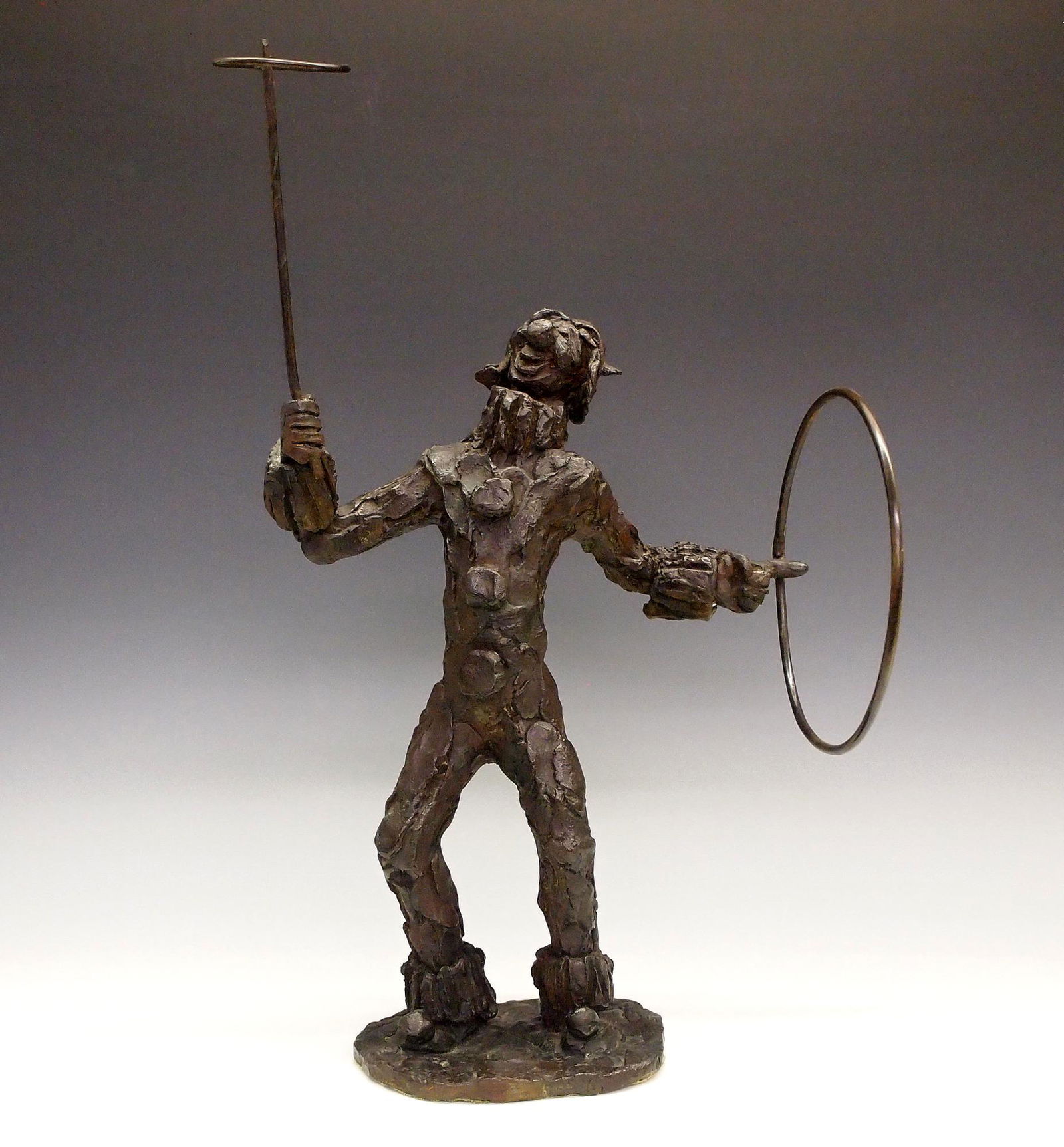 Bronze Clown Sculpture: A 20th century Bronze sculpture of a circus clown. Attributed to Prince Monyo Mihailescu-Nasturel Heresco (Romanian b.1926). Unsigned, minor wear. 18 1/4" high. ESTIMATE $200-400