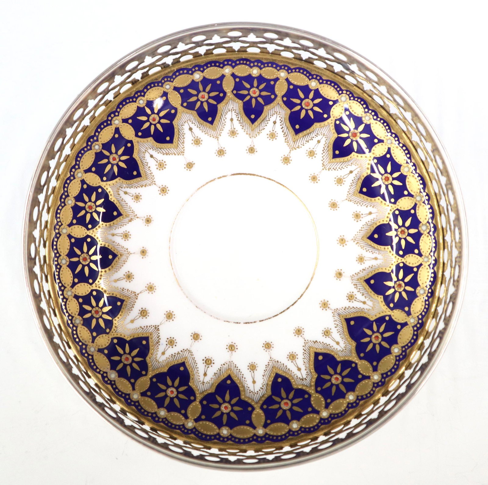 Spode/Tiffany Porcelain & Sterling Dish: An early 20th century Dish by Spode, for Tiffany & Co.. Consisting of cobalt blue and gold decorated porcelain in a Gorham Sterling pierced frame. Wear to the gold decoration, some indentations to the