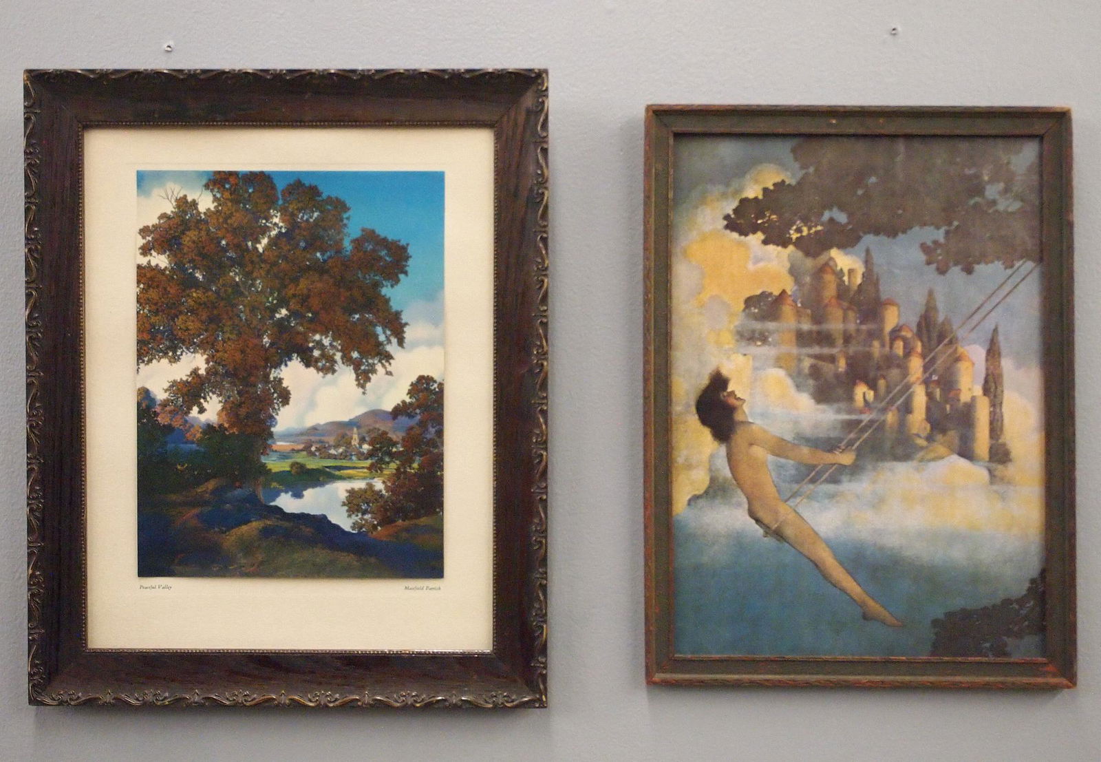 2 Maxfield Parrish Prints: Maxfield Parrish, American, 1870-1966. Two 20th century prints entitled "Peaceful Valley" and "The Dinkey Bird". Period frames with minor damage. Up to 13 1/2 x 16 1/2" high. ESTIMATE $100-200