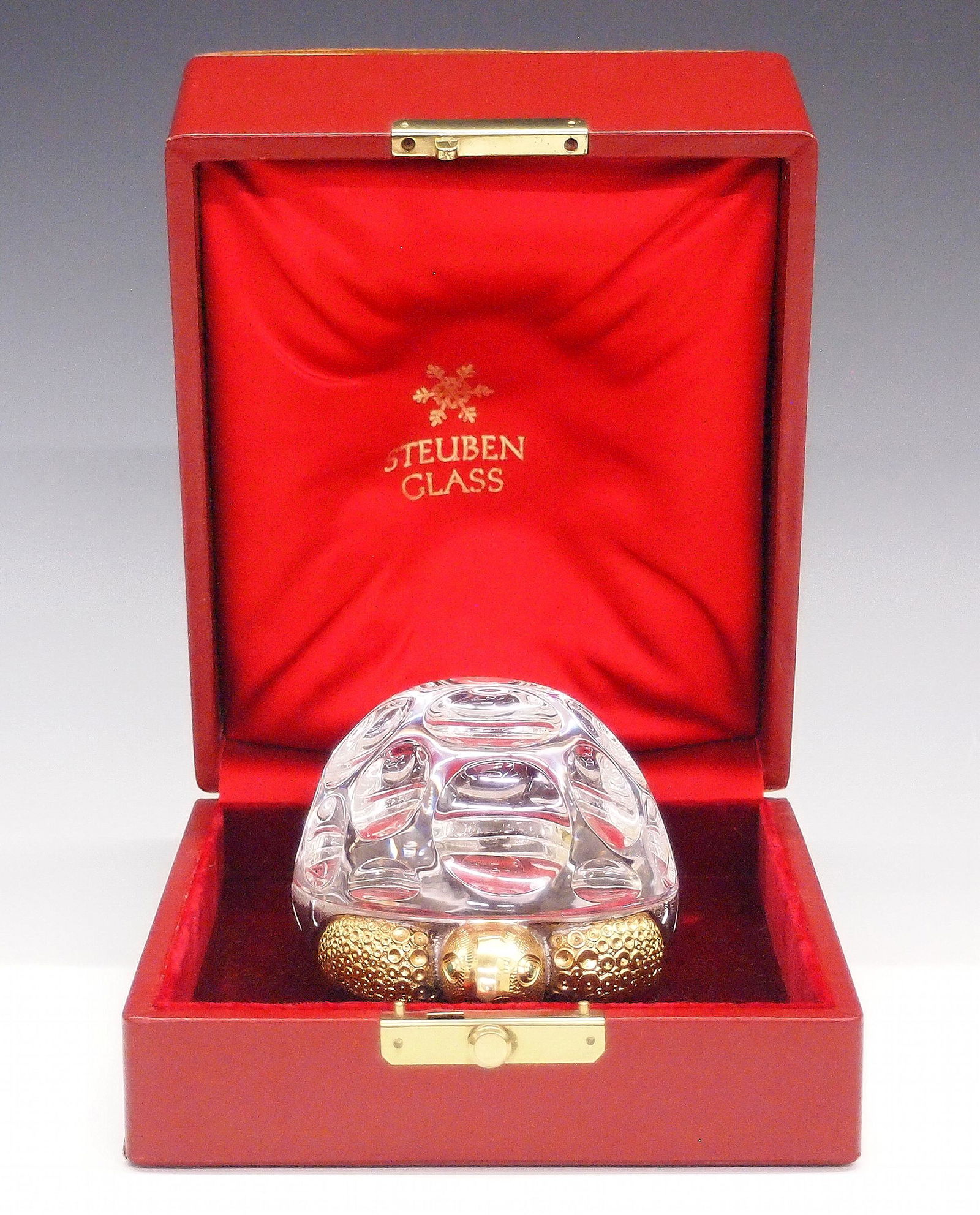 Steuben Turtle: A Steuben Crystal "Turtle". Consisting of clear crystal and vermeil sterling; model 1016, designed by Peter Schulze, 1969. Signed "Steuben" and stamped "Sterling Steuben" at the underside, includes or