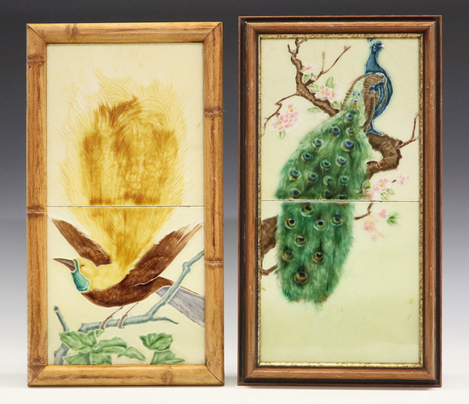 2 Henry Richards Tiles: Two early 20th century Henry Richards Ceramic tile panels. Each panel is comprised of two glazed tiles that are framed as one. Includes a peacock on an Cream ground and an exotic bird, or "Bird of Par