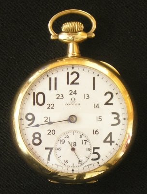 Omega Pocket watch: An early 20th century Omega pocket watch with swing out case. Swiss 21 jewel Railroad grade movement with "Canadian" dial. Minor case wear, monogrammed. Approx. 2" diameter. ESTIMATE $100-200Omega