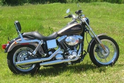 2004 Harley Dyna Glide Low Rider: A 2004 Harley Davidson Dyna Glide Low Rider (FXDL) motorcycle. Very low milage, (24 ACTUAL MILES) barely used in showroom condition.