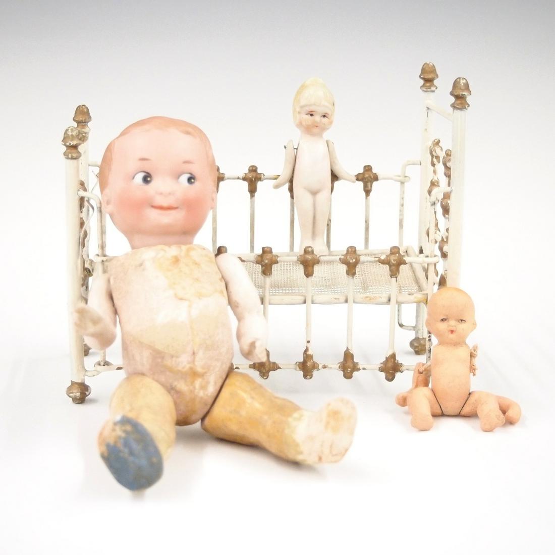 Porcelain Dolls and Miniature Crib (1 of 1)
